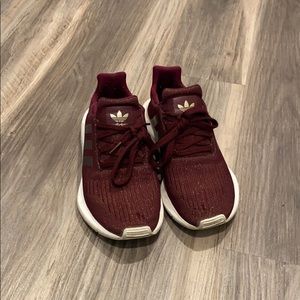 Maroon Adidas running shoes